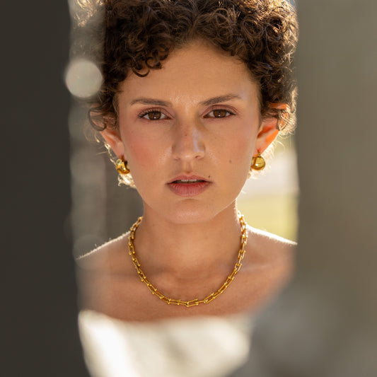 The Connection necklace worn, chunky gold link necklace, waterproof jewelley