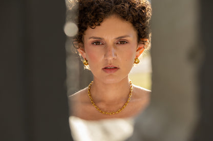 The Connection necklace worn, chunky gold link necklace, waterproof jewelley